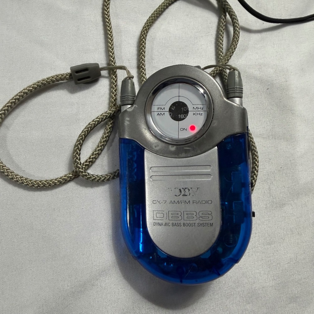 Coby CX-7 AM/FM Portable Radio DBBS Neck Strap Earbuds Manual Pouch Working